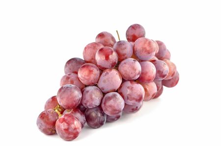 Bunch red grapes isolated on white の写真素材