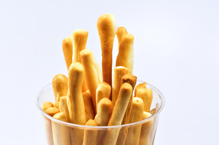 crispy bread sticks on white background