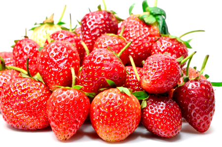 Ripe red strawberries on white backgroundの写真素材