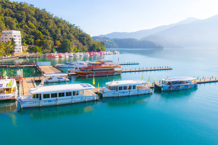 Sunrise in Sun Moon Lake Taiwan with boatのeditorial素材