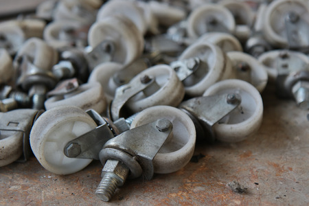 Casters wheels behind a shed abandonedの写真素材