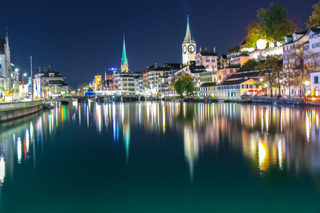 Zurich, Switzerland - Oct 13, 2018 : Beautiful view historic Zurich city center with famous Fraumunster Church and river Limmat in twilight.のeditorial素材