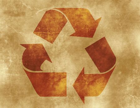 Recycle sign on old paper backgroundの写真素材