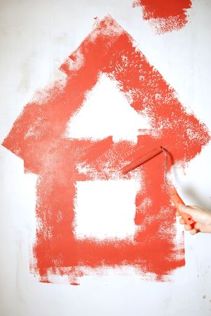painting a wall with a rollの写真素材