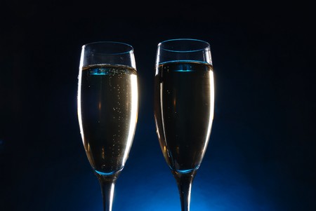 champagne glasses on dark backgroundの写真素材