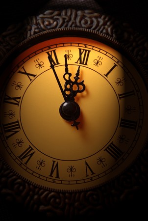 old clock showing time about twelve