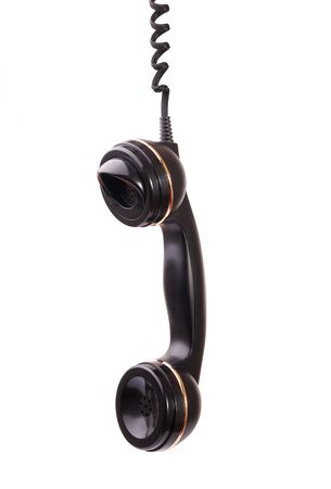 Vintage telephone receiver on whiteの写真素材