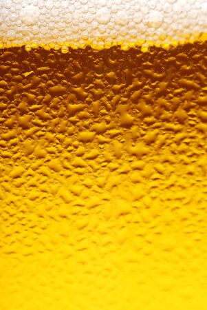 Fresh beer dewy glass texture close-upの写真素材