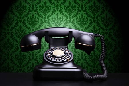Vintage phone on dark backgroundの写真素材