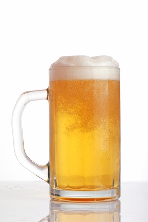 Glass of beer close-up with frothの写真素材