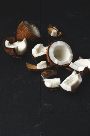 close up of coconut pieces on a wooden backgroundの写真素材