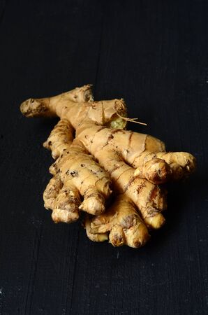 Ginger root closeup on dark backgroundの写真素材