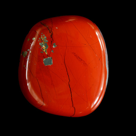 red jasper mineral stone, isolated on black backgroundの写真素材