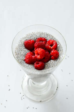 coconut chia seed pudding with fresh berriesの写真素材