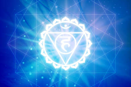 Vishudha Chakra symbol on a blue background. This is the fifth Chakra, also called The Throat Chakraの写真素材