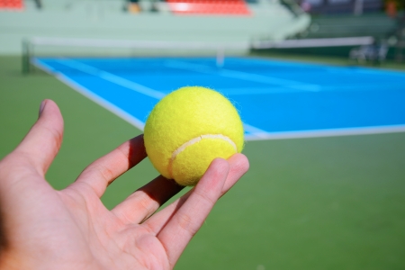 tennis player serve a tennis ballの写真素材