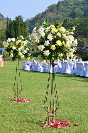 White flowers decorations during outdoor wedding ceremonyの写真素材