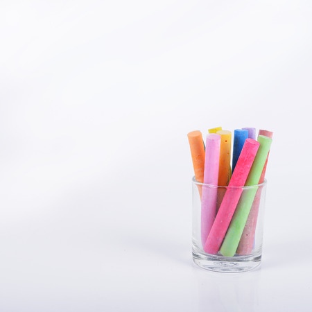 color chalk isolated on white backgroundの写真素材