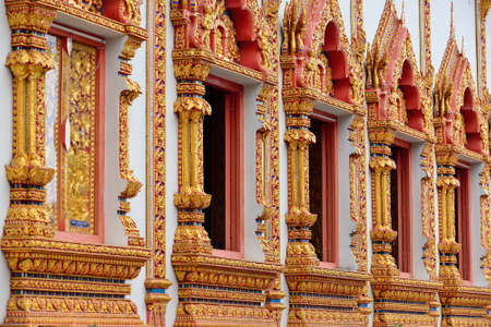 Sculpture on the window temple of buddhism, Wat Mahawan temple in Lamphun, Northern Thailand, Thailandの写真素材