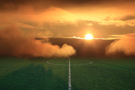 soccer field stadium on the green grass, sunshine sport game background for designの写真素材