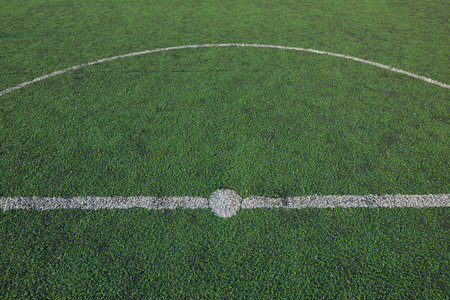 Artificial soccer field stadium on the green grass, sport game background for designの写真素材