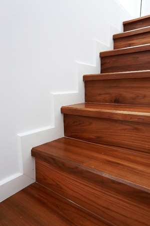 wooden staircase in a white modern houseの写真素材
