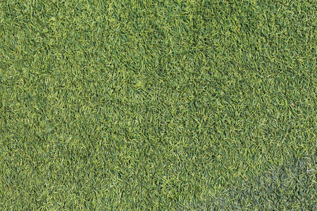 artificial green grass turf texture backgroundの写真素材
