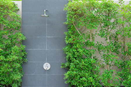 head shower at swimming poolの写真素材