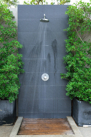 head shower water stream at swimming poolの写真素材