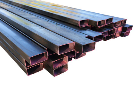 Stack of steel metal pipes isolatedの写真素材