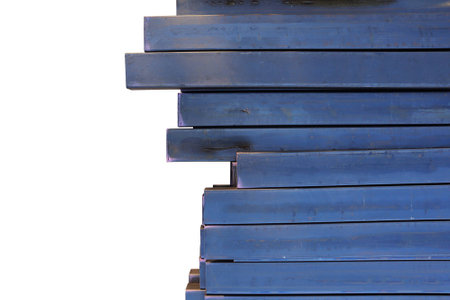 Stack of steel metal pipes isolatedの写真素材