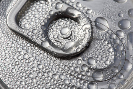 Can of soft drink with water drops