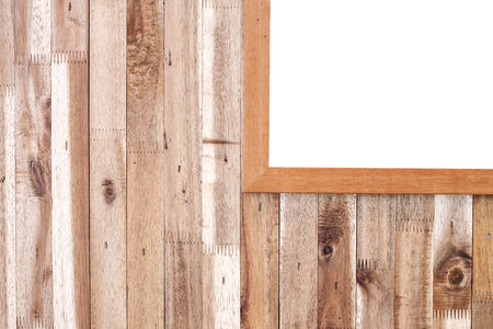 photo frame on wooden board backgroundの写真素材