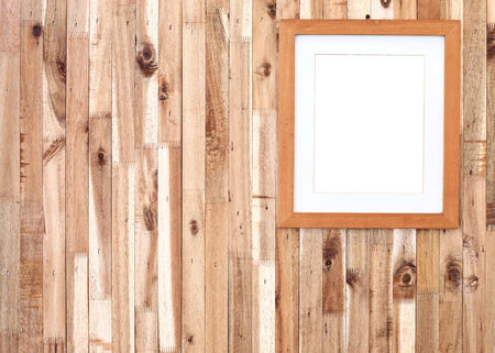 photo frame on wooden board backgroundの写真素材