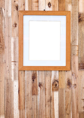 photo frame on wooden board backgroundの写真素材