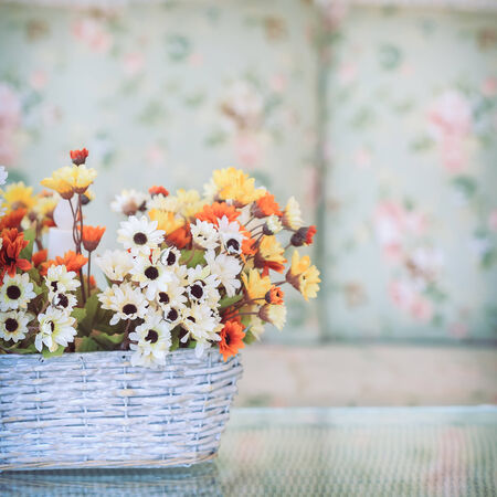 flowers in basket vase decorated living roomの写真素材