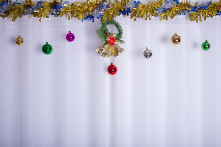christmas background, bell decorate on white curtainの写真素材