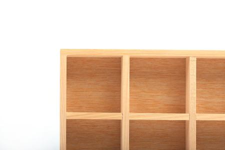 wood shelves isolated on white backgroundの写真素材