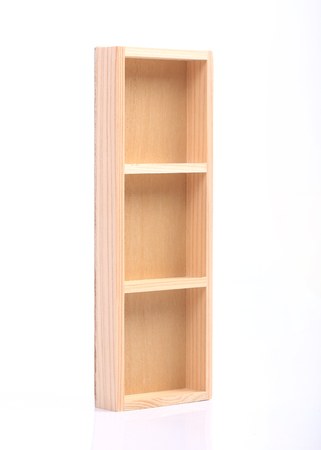 wood shelves isolated on white backgroundの写真素材