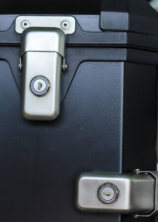 keyhole security lock on the black of boxの写真素材