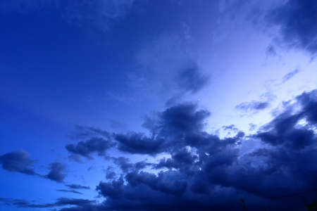 beautiful night sky with cloud backgroundの写真素材