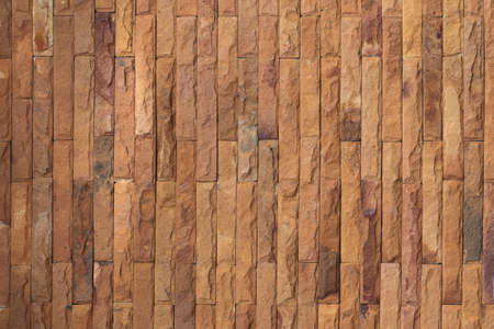 brown stone wall texture backgroundの写真素材