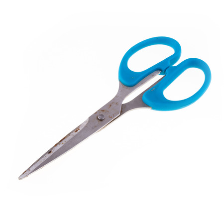 blue scissors rusty isolated on white backgroundの写真素材