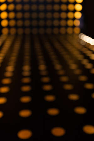 orange background of circle light bokeh blur defocusedの写真素材