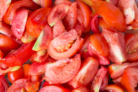 heap of sliced red tomatoes freshnessの写真素材