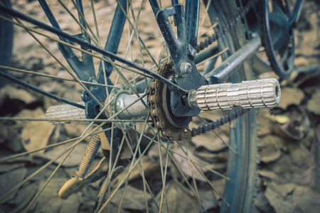 bicycle and autumn dry leaves fall on the groundの写真素材