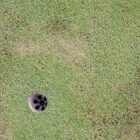 golf hole on green grass, golf courseの写真素材