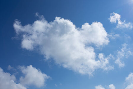 white cloud with clear blue sky backgroundの写真素材