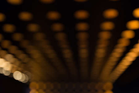 orange background of circle light bokeh blur defocusedの写真素材