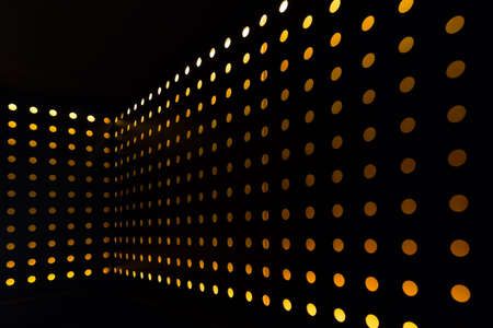 orange circle light decorated wall in nightclubの写真素材